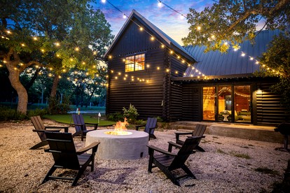 Spacious and Pet Friendly Log Cabin for Sixteen Guests in Fredericksburg, Texas - glamping.directory