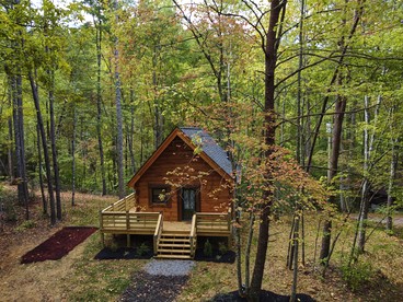 Stunning Cabin Nestled Amidst Trees with Hot-tub in Sevierville, Tennessee - glamping.directory