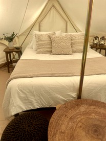 Enchanting Mountain Glamping Tents with Elevated Decks and Fire Pit Near Gentry, AR - Gentry, Arkansas - glamping.directory