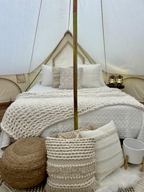 Enchanting Mountain Glamping Tents with Elevated Decks and Fire Pit Near Gentry, AR - Gentry, Arkansas - glamping.directory
