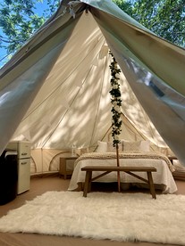 Enchanting Mountain Glamping Tents with Elevated Decks and Fire Pit Near Gentry, AR - Gentry, Arkansas - glamping.directory
