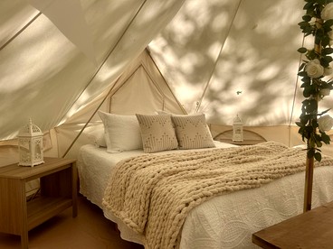 Enchanting Mountain Glamping Tents with Elevated Decks and Fire Pit Near Gentry, AR - Gentry, Arkansas - glamping.directory