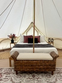 Enchanting Mountain Glamping Tents with Elevated Decks and Fire Pit Near Gentry, AR - glamping.directory