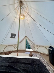 Enchanting Mountain Glamping Tents with Elevated Decks and Fire Pit Near Gentry, AR - Gentry, Arkansas - glamping.directory