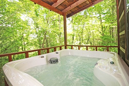 Snug and Cozy Cabin Rental with a Hot Tub near Copperhill for a Relaxing Vacation in Tennessee - Copperhill, Tennessee - glamping.directory