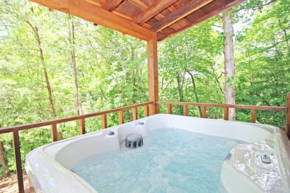 Snug and Cozy Cabin Rental with a Hot Tub near Copperhill for a Relaxing Vacation in Tennessee - Copperhill, Tennessee - glamping.directory