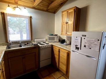 Serenity by the River: Romantic Cabin with Fireplace in San Miguel County, New Mexico - San Miguel County, New Mexico - glamping.directory