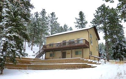 Impressive Cabin Rental with Views of Pike National Forest near Colorado Springs, Colorado - glamping.directory