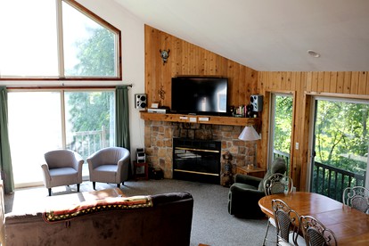 Lakefront Vacation Rental with a Deck and Hot Tub near Wisconsin Dells - Tomah, Wisconsin - glamping.directory