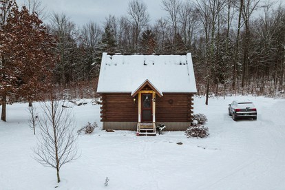 Cozy Log Cabin with an Indoor Fireplace Located on 70 Forested Acres in Leicester, Vermont - Leicester, Vermont - glamping.directory