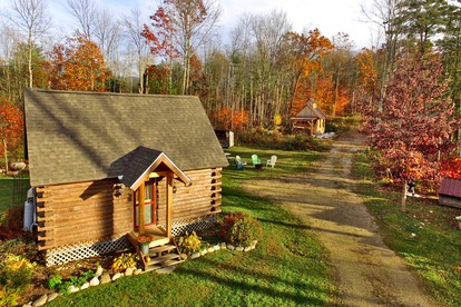 Cozy Log Cabin with an Indoor Fireplace Located on 70 Forested Acres in Leicester, Vermont - Leicester, Vermont - glamping.directory