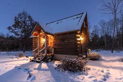 Cozy Log Cabin with an Indoor Fireplace Located on 70 Forested Acres in Leicester, Vermont - glamping.directory