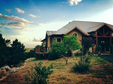 Luxury Four-Bedroom Cabin Rental with a Fireplace in New Braunfels, Texas - New Braunfels, Texas - glamping.directory
