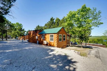 Chic Cabin Stay with Loft, Pool Access & Outdoor Fire Pit in Branson, Missouri - glamping.directory