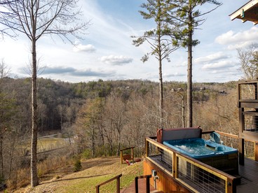Luxury Three-Story Riverfront Cabin Rental for Groups in Blue Ridge Region of Georgia - Blue Ridge, Georgia - glamping.directory