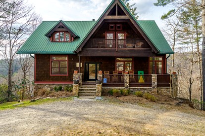 Luxury Three-Story Riverfront Cabin Rental for Groups in Blue Ridge Region of Georgia - glamping.directory