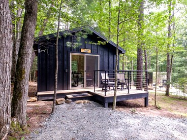 Pet-Friendly Paradise: Luxury Glamping Cabin in Pisgah Forest for You and Your Furry Friend - glamping.directory