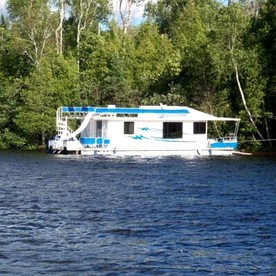 Luxury Wide-Body Houseboat with Flybridge Steering & Water Slide Near Birch Lake, Babbitt, Minnesota - glamping.directory