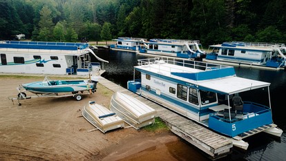 Luxury Wide-Body Houseboat with Flybridge Steering & Water Slide Near Birch Lake, Babbitt, Minnesota - Babbitt, Minnesota - glamping.directory