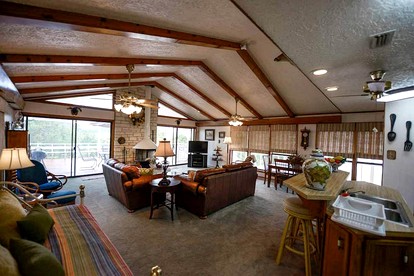 Riverfront Cabin with Spacious Interior, Large Deck and Views in Texas - Wimberley, Texas - glamping.directory