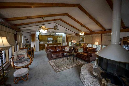 Riverfront Cabin with Spacious Interior, Large Deck and Views in Texas - Wimberley, Texas - glamping.directory
