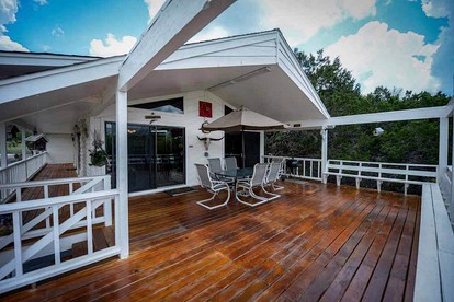 Riverfront Cabin with Spacious Interior, Large Deck and Views in Texas - glamping.directory