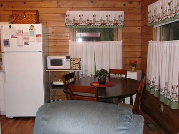 Charming Woodland Cabin with Cozy Porch & Green Space in Cripple Creek, Colorado - Cripple Creek, Colorado - glamping.directory