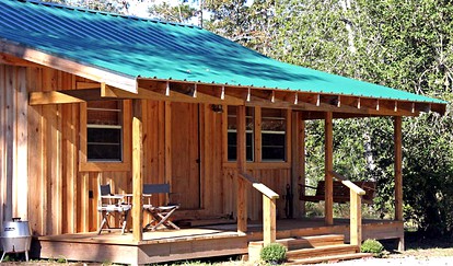 Rustic Cabin Getaway with Stunning Front Porch near Beaumont, Texas - glamping.directory