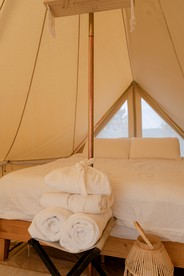 Escape to the Stars: Bell Tent Getaway for Couples in Michigan's Idyllic Destination - Boyne Falls, Michigan - glamping.directory