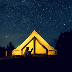 Escape to the Stars: Bell Tent Getaway for Couples in Michigan's Idyllic Destination - Boyne Falls, Michigan - glamping.directory