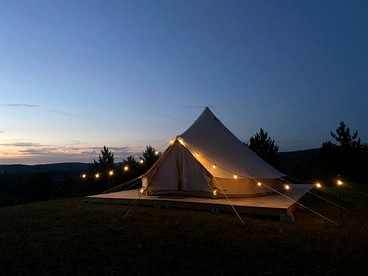 Escape to the Stars: Bell Tent Getaway for Couples in Michigan's Idyllic Destination - Boyne Falls, Michigan - glamping.directory