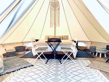 Escape to the Stars: Bell Tent Getaway for Couples in Michigan's Idyllic Destination - Boyne Falls, Michigan - glamping.directory