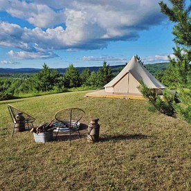Escape to the Stars: Bell Tent Getaway for Couples in Michigan's Idyllic Destination - glamping.directory