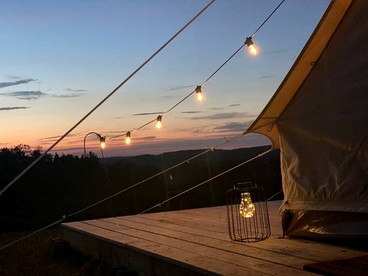 Escape to the Stars: Bell Tent Getaway for Couples in Michigan's Idyllic Destination - Boyne Falls, Michigan - glamping.directory
