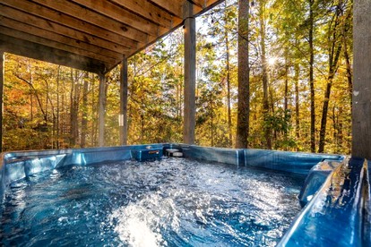 Retreat to the Smokies: Glamping Cabin with Hot Tub and Games Room - Sevierville, Tennessee - glamping.directory