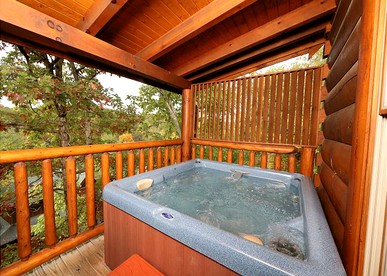 Authentic Cabin with Hot Tub on the Deck near Gatlinburg, Tennessee - Sevierville, Tennessee - glamping.directory
