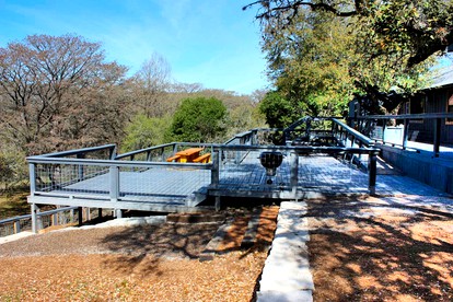 Gorgeous Medina River Cabin with a Spacious Deck Ideal for Vacations in Texas - Bandera, Texas - glamping.directory