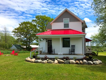 Historic Vacation Rental on Acres of Farmland near Aloha State Park, Michigan - glamping.directory