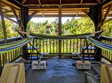 Single Hammock Rental in a Coed Outdoor Dorm near Akaka Falls, Hawaii - Pepeekeo, Hawaii - glamping.directory