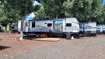 Modern Pet-Friendly RV Suite with Private Deck, Firepit & Full Kitchen near Williams, Arizona - glamping.directory