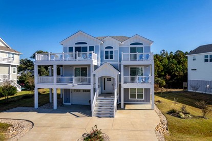 Luxury Coastal Escape with Private Pool, BBQ Grill & Family Amenities in Corolla, North Carolina - glamping.directory