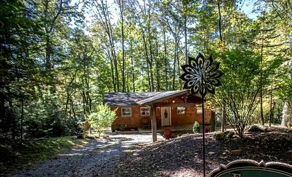 Lovely Cabin with Hot Tub Surrounded by Trees for a Peaceful Getaway in Nature in Boone, North Carolina - glamping.directory