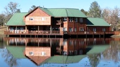 Secluded Lodge with a Private Pond and a Hot Tub near Bastrop, Texas - McDade, Texas - glamping.directory