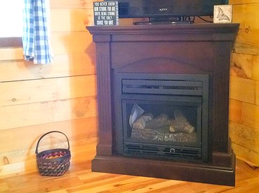 Cozy Cabin Rental with a Four-Person Hot Tub near Hocking Hills State Park, Ohio - Logan, Ohio - glamping.directory