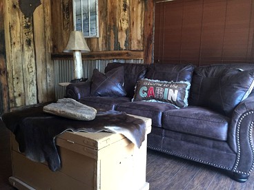 Gorgeous Rustic Log Cabin Rental with Fire Pit in Cotter, Arkansas - Cotter, Arkansas - glamping.directory
