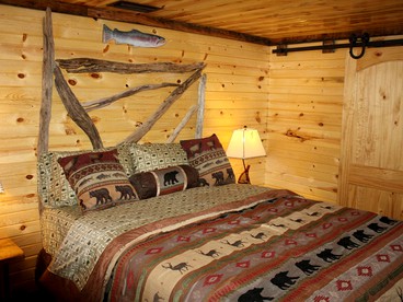 Gorgeous Rustic Log Cabin Rental with Fire Pit in Cotter, Arkansas - Cotter, Arkansas - glamping.directory