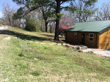 Gorgeous Rustic Log Cabin Rental with Fire Pit in Cotter, Arkansas - Cotter, Arkansas - glamping.directory