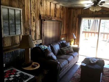 Gorgeous Rustic Log Cabin Rental with Fire Pit in Cotter, Arkansas - Cotter, Arkansas - glamping.directory