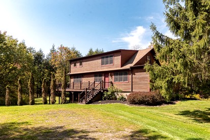 Rustic-Chic Cabin Getaway with Wraparound Deck & Cozy Fireplace in Margaretville, New York - glamping.directory
