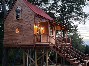 Unique Treehouse Accommodation for a Secluded Granite Lake Getaway - Stoddard, New Hampshire - glamping.directory